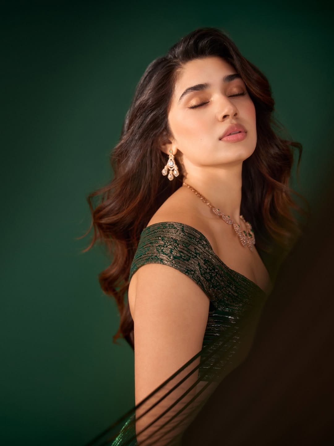 Krithi Shetty Shines in Metallic Green Gown with Elegant Gold Accents