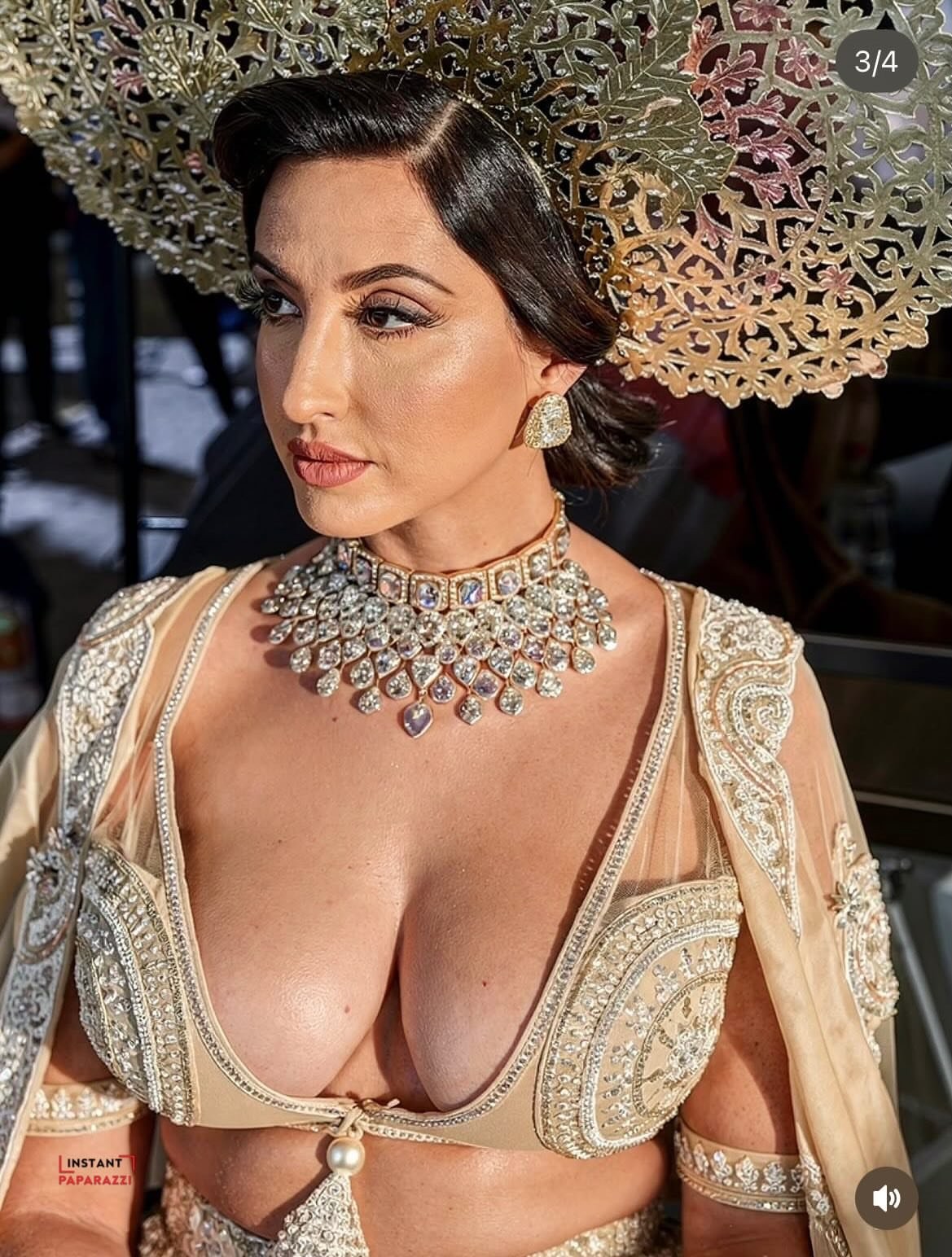 Nora Fatehi Shines in Regal Ivory Ensemble by Abu Jani Sandeep Khosla