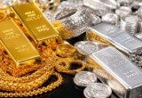 Gold Holds Steady, Silver Slides in Mid-June Trade