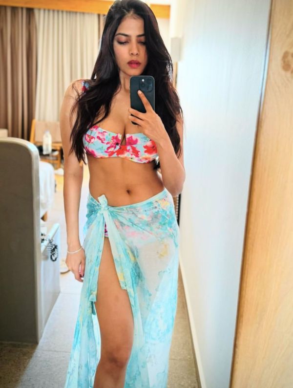 Malavika Mohanan’s Beach Glamour: Floral Bikini and Sun-Kissed Vibes